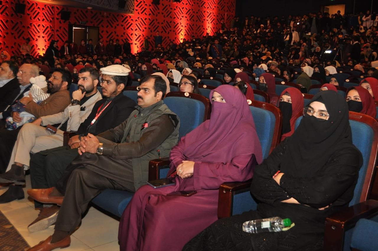 Zainab Siddique seated with guests at International Volunteer Day 3.0